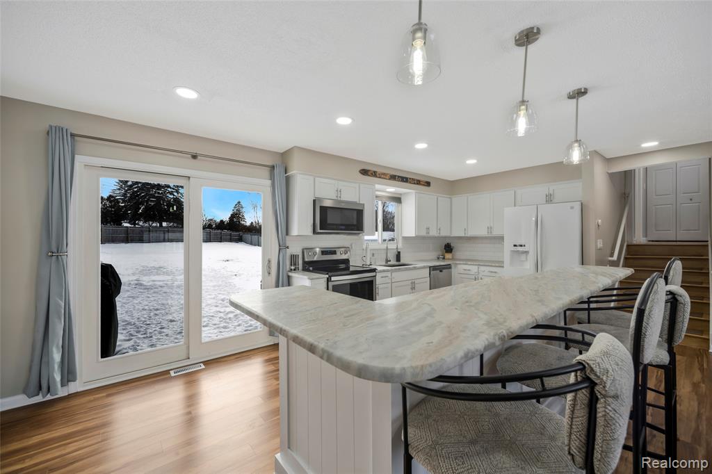 9488 Brookway Court, Goodrich Vlg, MI — Photo 19