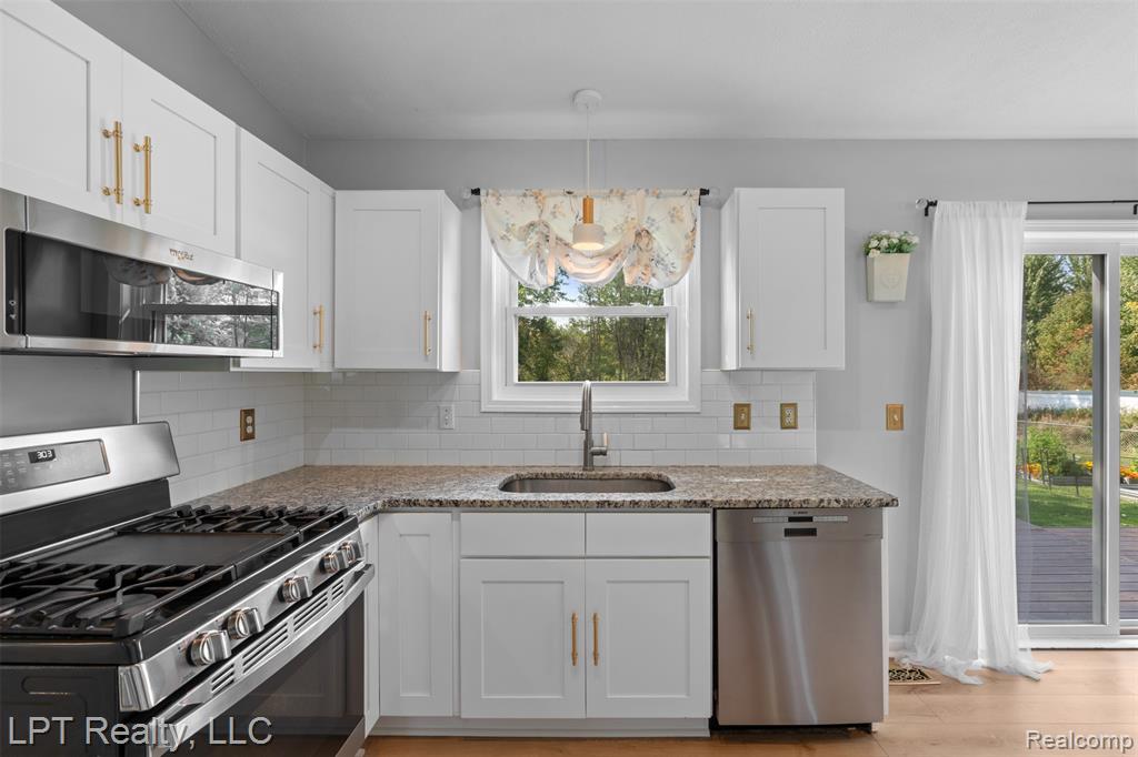 411 FOWLERVILLE Road, Fowlerville, MI 48836 — Photo 4