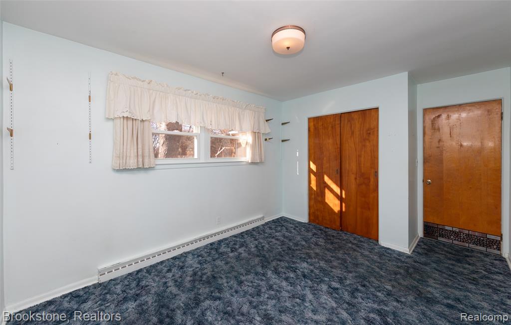 656 S CASS LAKE Road, Waterford, MI 48328 — Photo 27