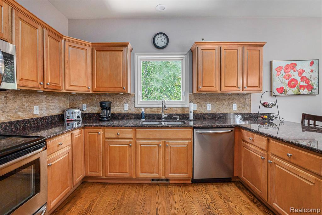 1799 Elkridge Circle, Highland, MI 48356 — Photo 14