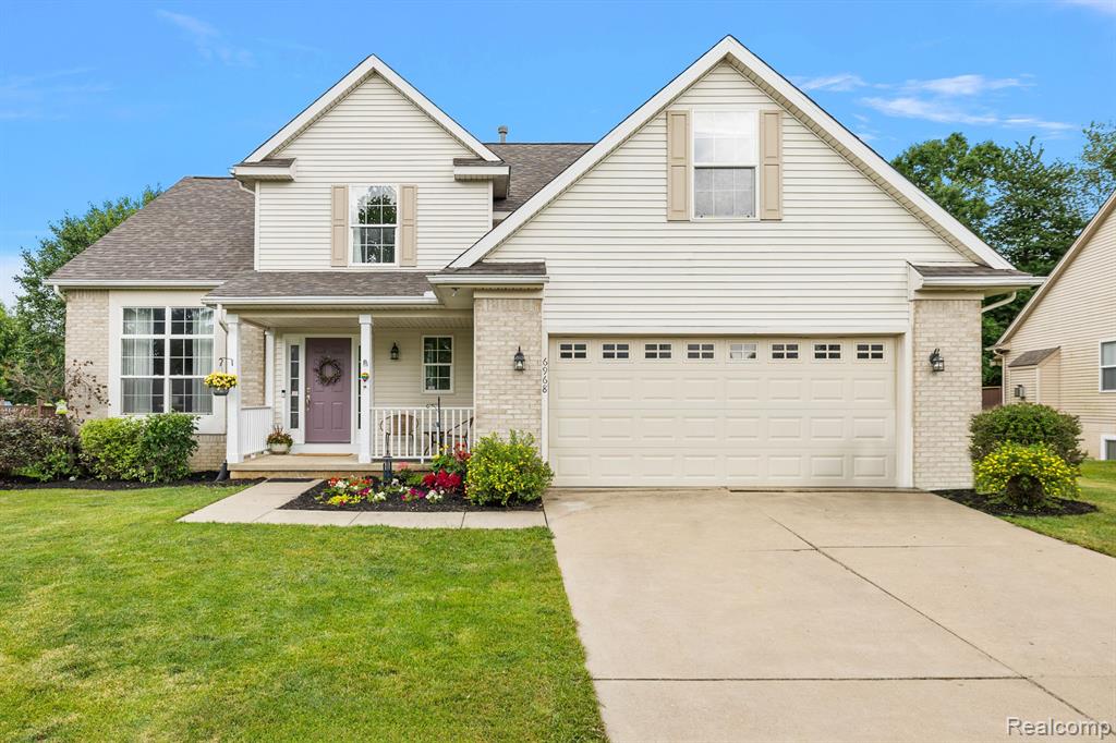 6968 Wellington Drive, Dexter, MI 48130 — front exterior