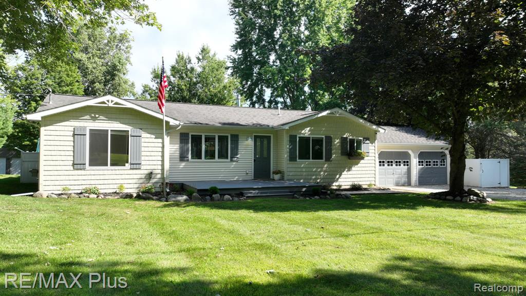 102 W Sawdust Corners Road, Mayfield, MI 48446 — front exterior
