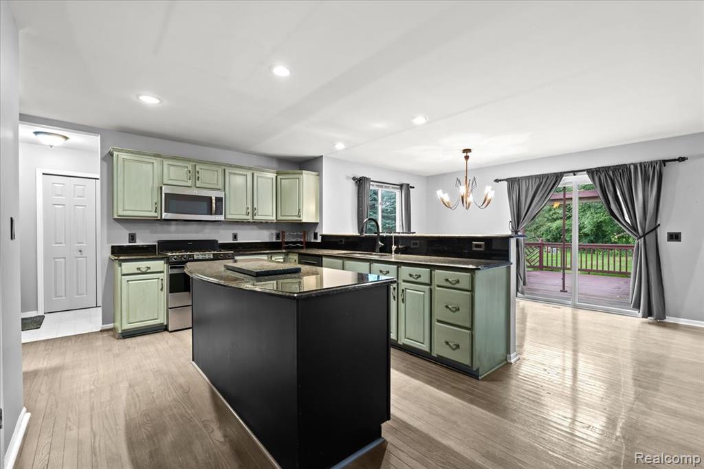 8477 Mist Field Court, Howell, MI 48843 — Photo 11