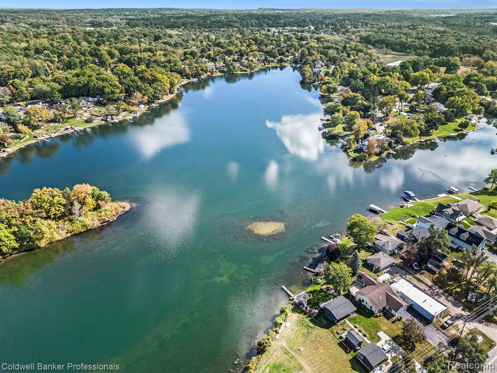 Aerial view of Susin Lake and house.