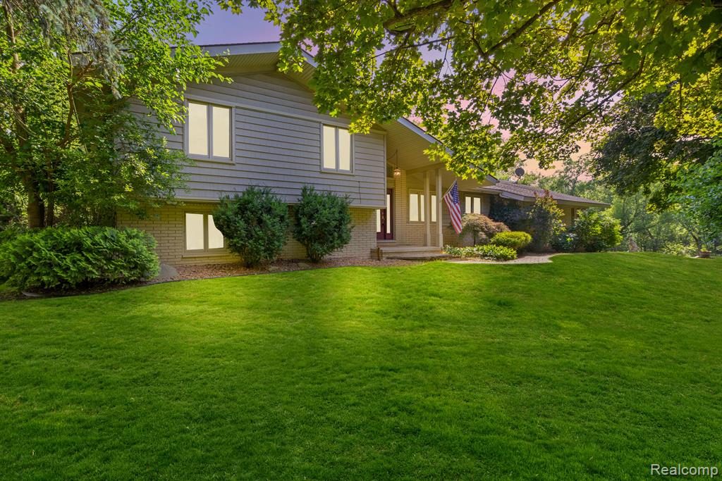 54655 PONTIAC Trail, Milford, MI 48381 — front exterior