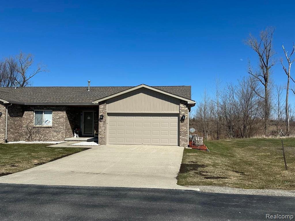 8538 E FOREST CREEK Drive, Port Austin, MI 48467 — front exterior