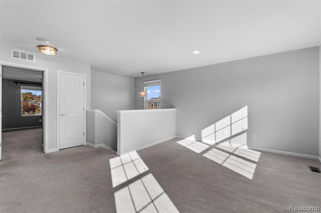 57570 Village Drive, New Hudson, MI 48165 — Photo 22
