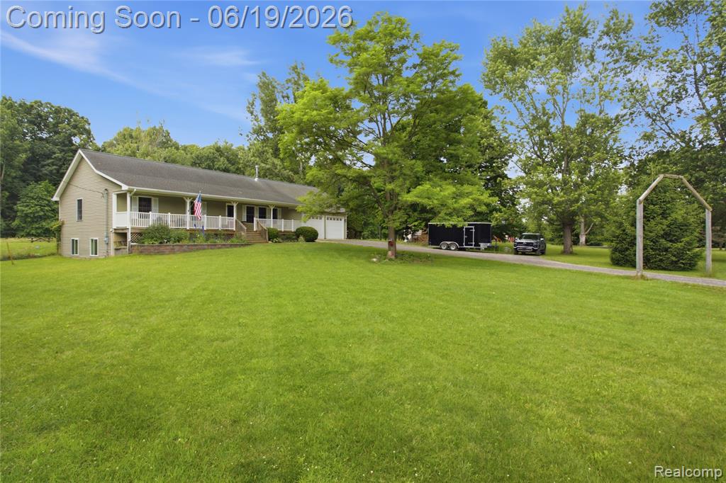 5739 Suntar Valley Drive, Fowlerville, MI 48836 — Photo 25