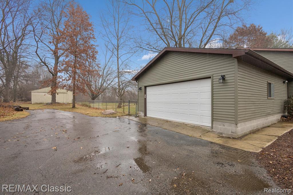 5594 Harper Road, Holt, MI 48842 — Photo 39