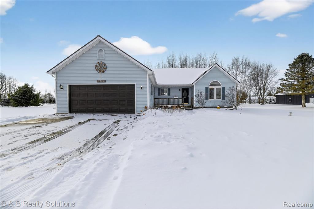 5769 Cobblestone Drive, North Branch, MI 48461 — front exterior