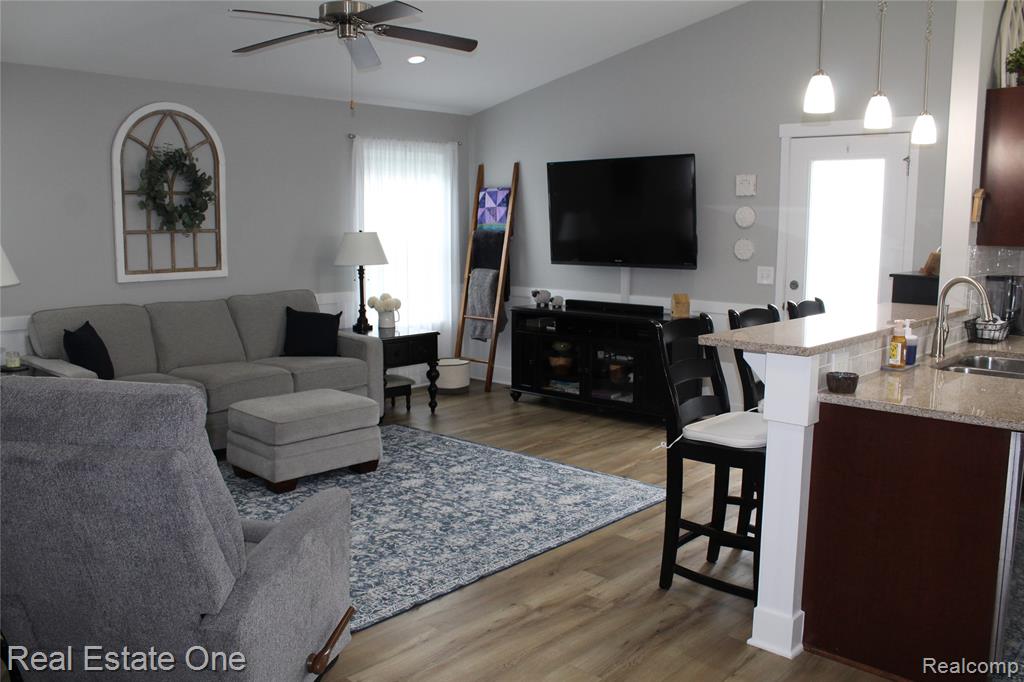 8662 Pinnebog River Drive, Fowlerville, MI 48836 — Photo 4