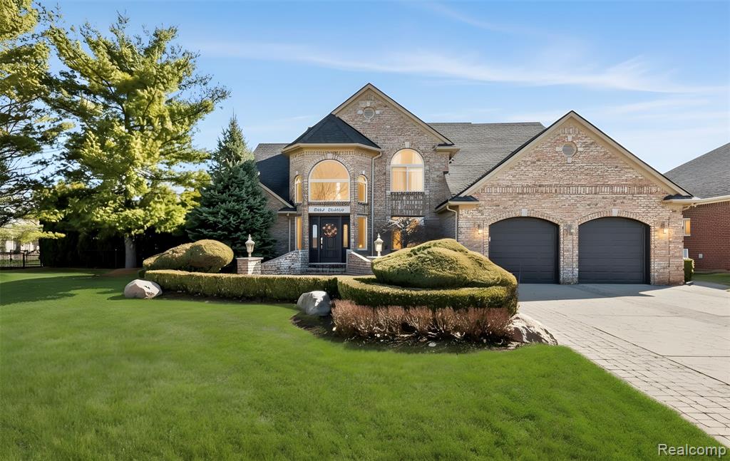 51246 Woodside Drive, Macomb, MI 48042 — front exterior