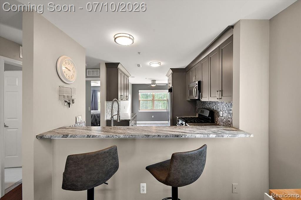 456 Boardwalk Drive, Walled Lake, MI 48390 — Photo 12