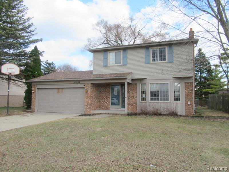 43120 Chaucer Drive, Sterling Heights, MI 48313 — front exterior