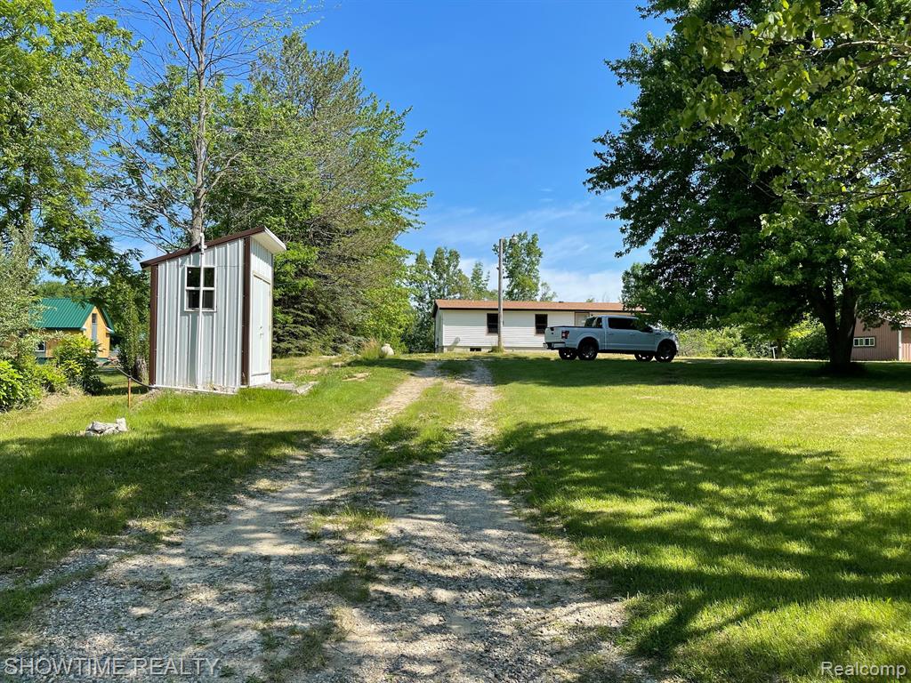 5957 LYONS Road, Imlay City, MI 48444 — front exterior