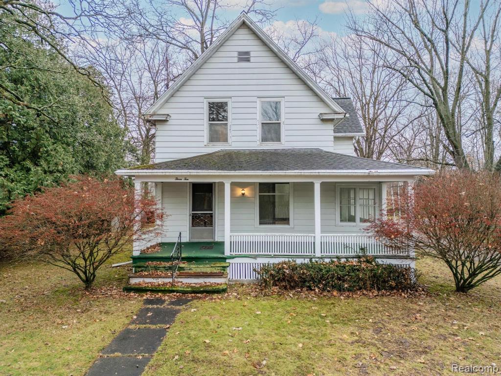 310 WOOD Street, Stockbridge, MI 49285 — front exterior