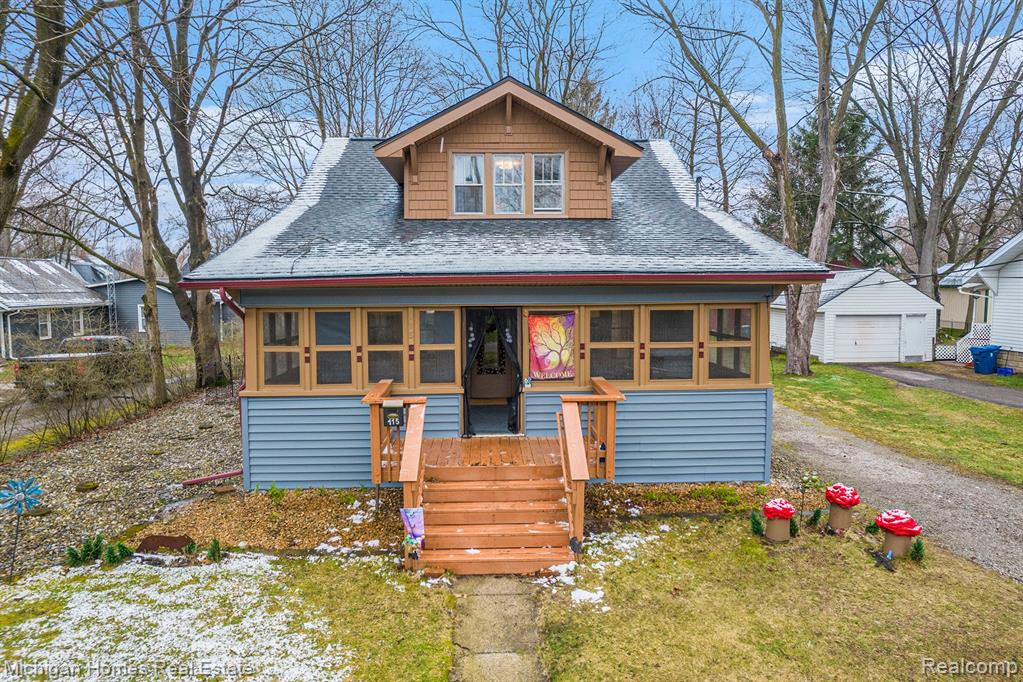 115 PARK Avenue, Holly, MI 48442 — front exterior