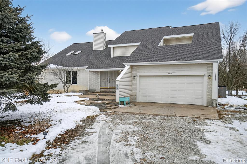 7083 E Mount Hope Highway, Grand Ledge, MI 48837 — front exterior