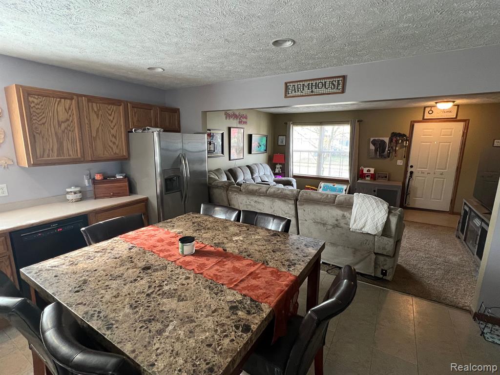 744 VILLAGE Drive, Fowlerville, MI 48836 — Photo 10