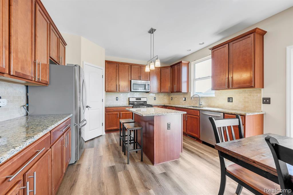 57879 CIDER MILL Drive, New Hudson, MI 48165 — Photo 16