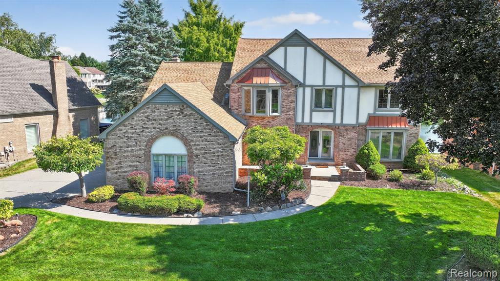 48342 Lake Valley Drive, Shelby Twp, MI 48317 — front exterior