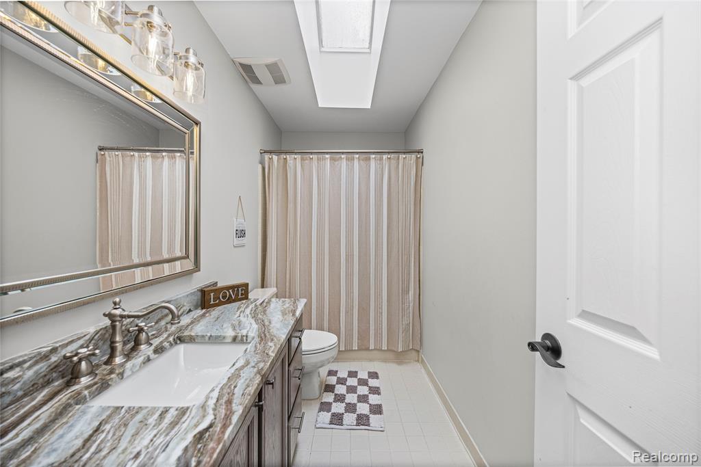 1874 Rothbury Drive, Wixom, MI 48393 — Photo 12