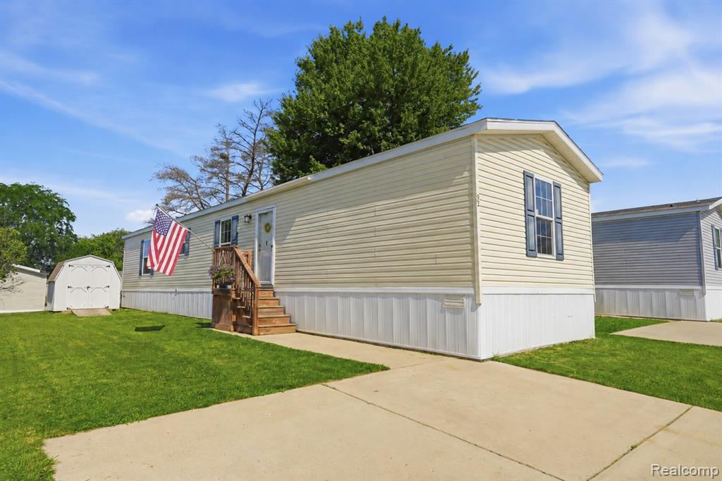 92 Normandy Drive, Howell, MI 48843 — front exterior