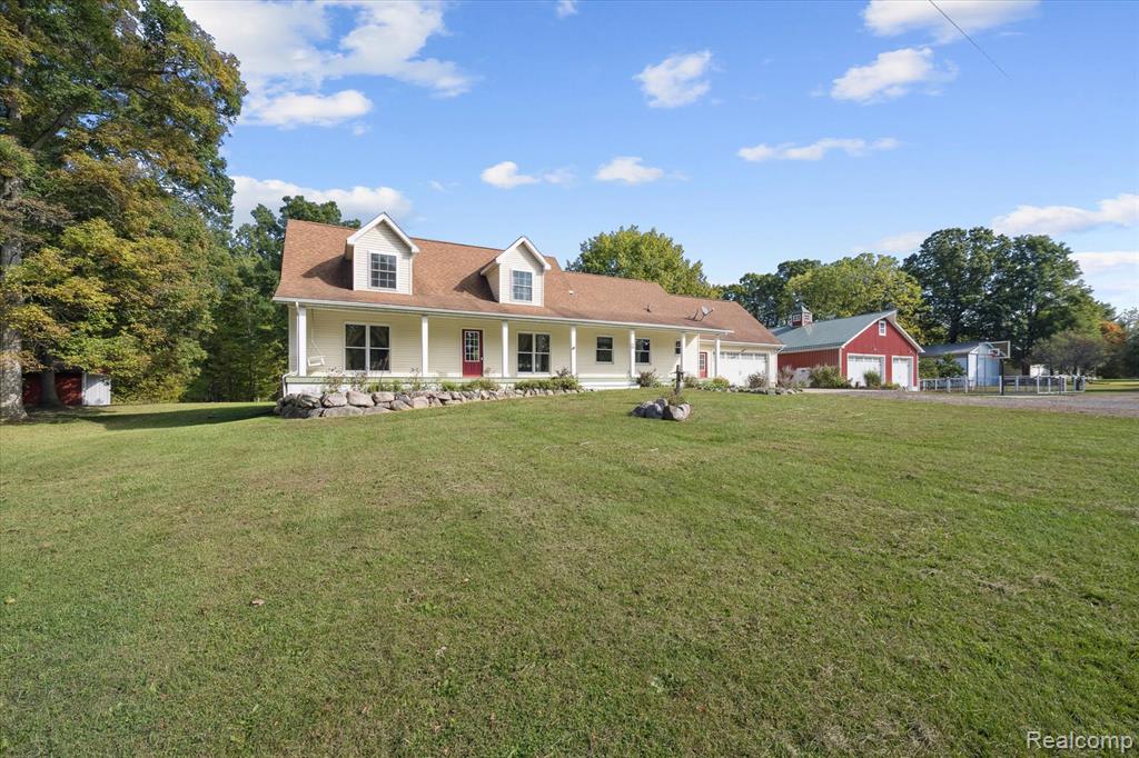 612 W Bath Road, Morrice, MI 48857 — front exterior