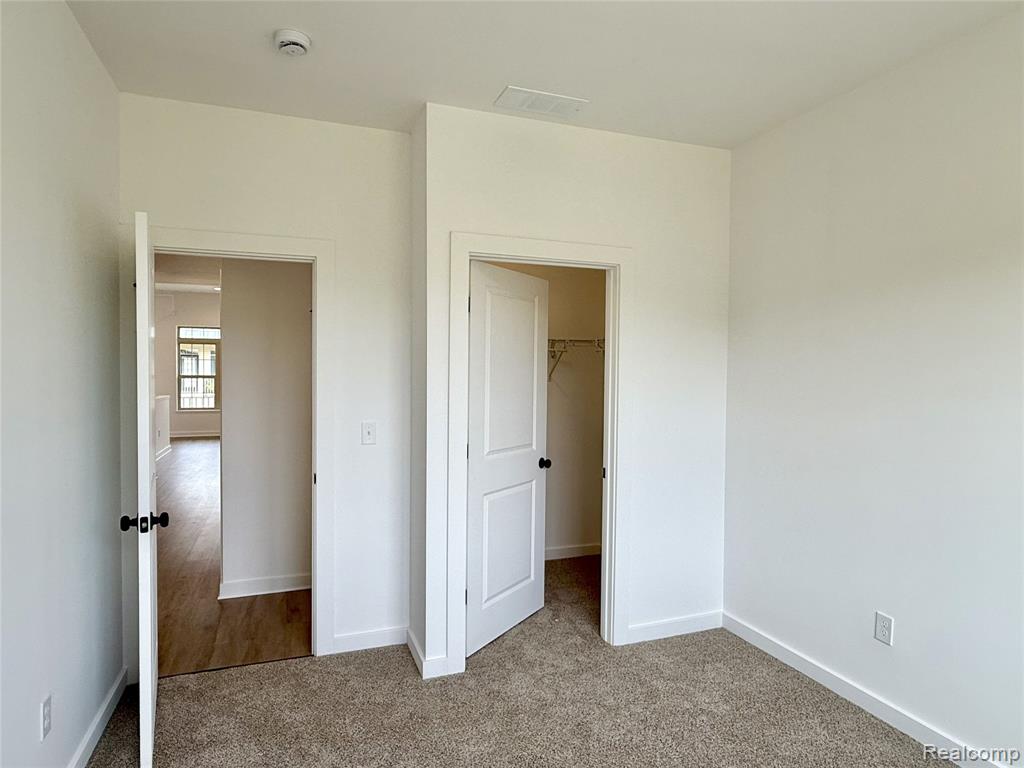 437 Village Drive, Walled Lake, MI 48390 — Photo 20