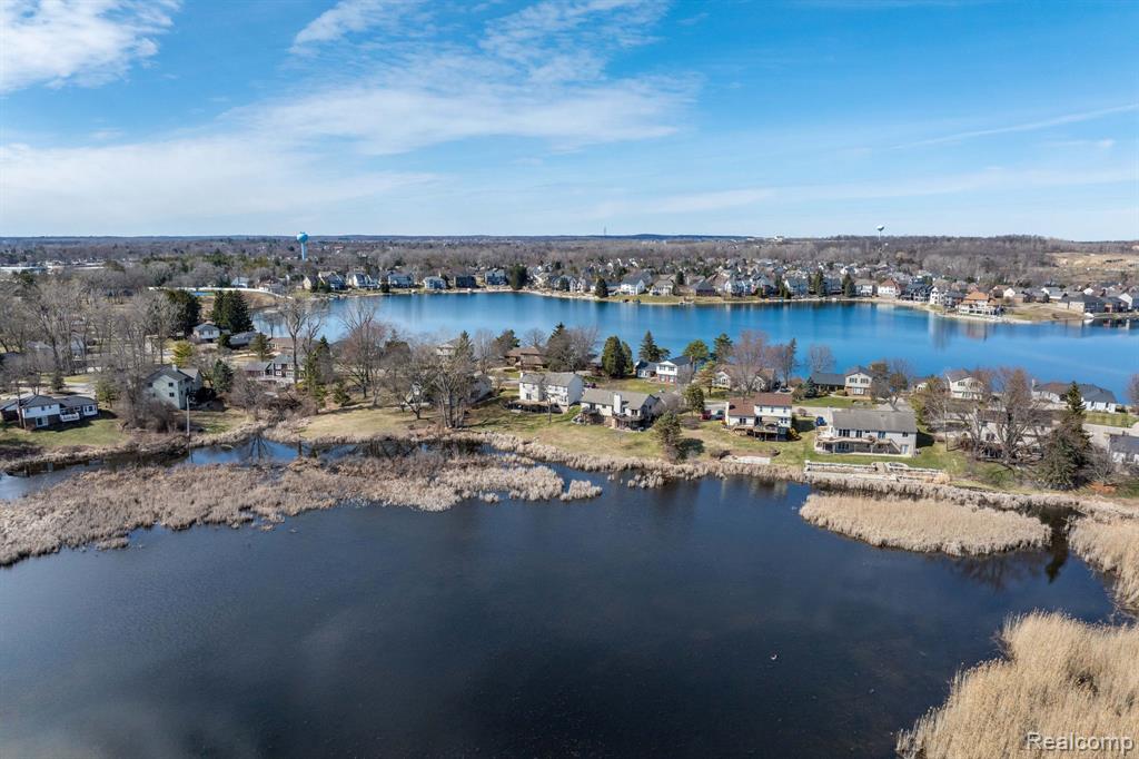 Water view with nearby suburban area