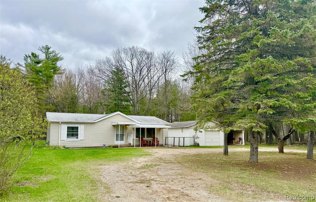 1851 S Loxley Road, Houghton Lake, MI 48629 — front exterior