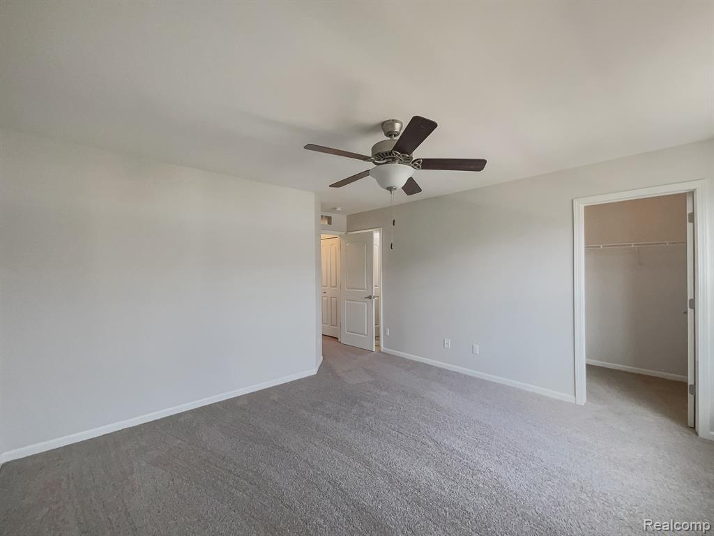 242 CENTER Boulevard, Wixom, MI 48393 — Photo 16