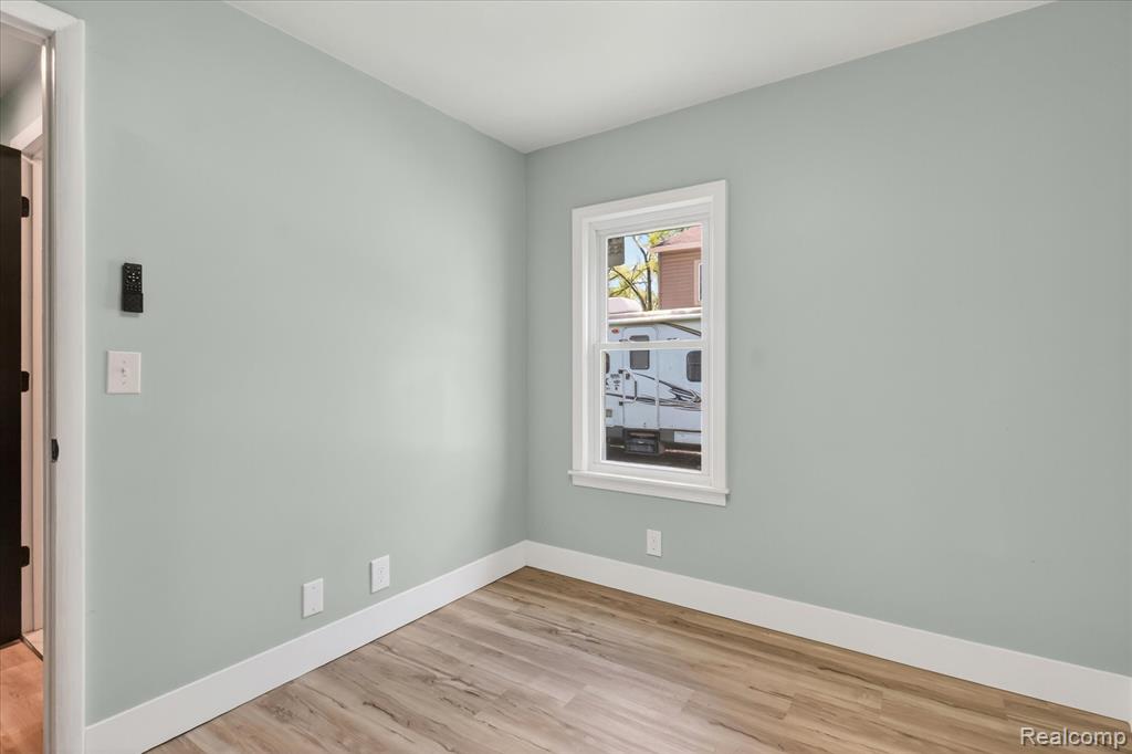 677 Lucille Drive, Wolverine Lake, MI 48390 — Photo 23