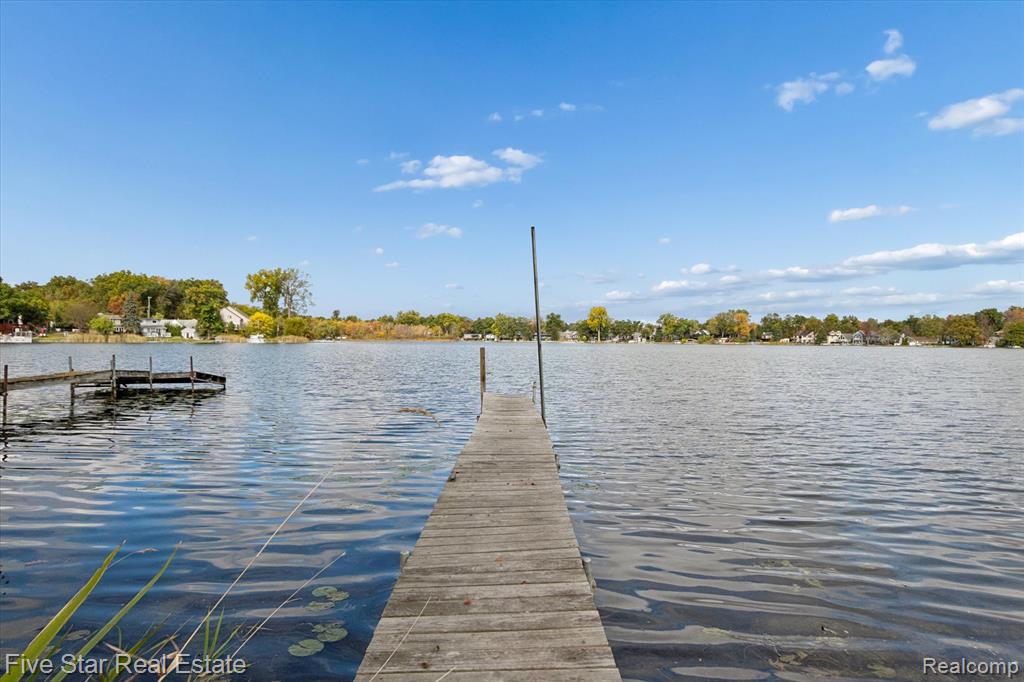 9548 Roundlake Boulevard NE, White Lake, MI — front exterior