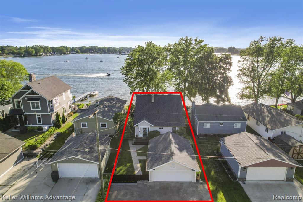 4253 Hunters Drive, Highland, MI 48356 — front exterior