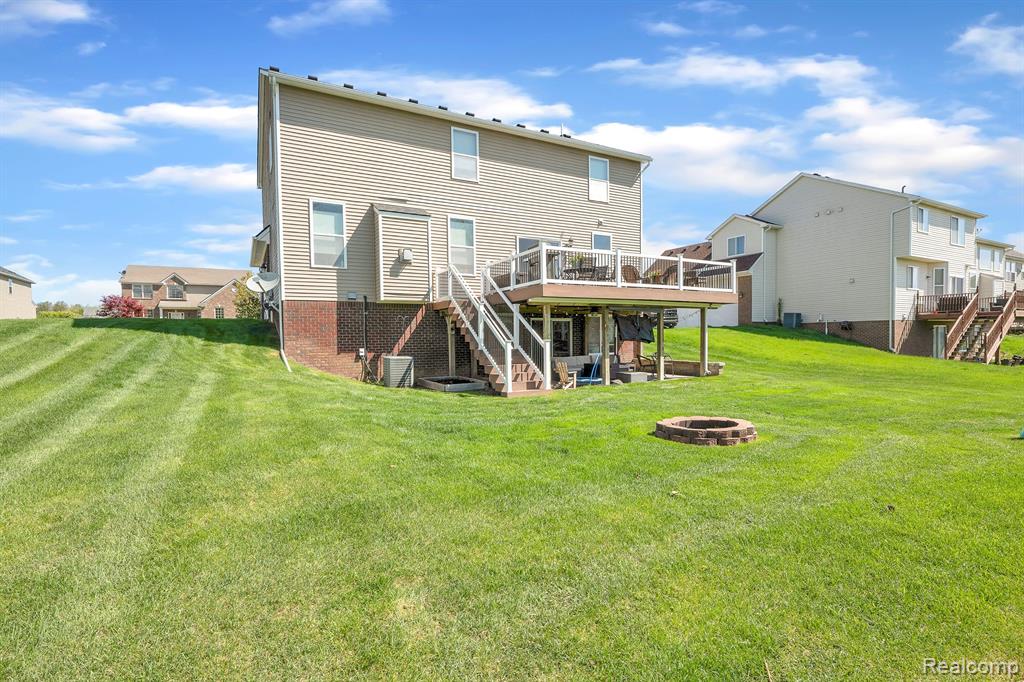 57879 CIDER MILL Drive, New Hudson, MI 48165 — Photo 67