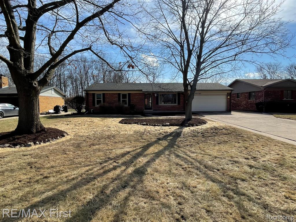 48065 Fuller Road, Chesterfield, MI — front exterior