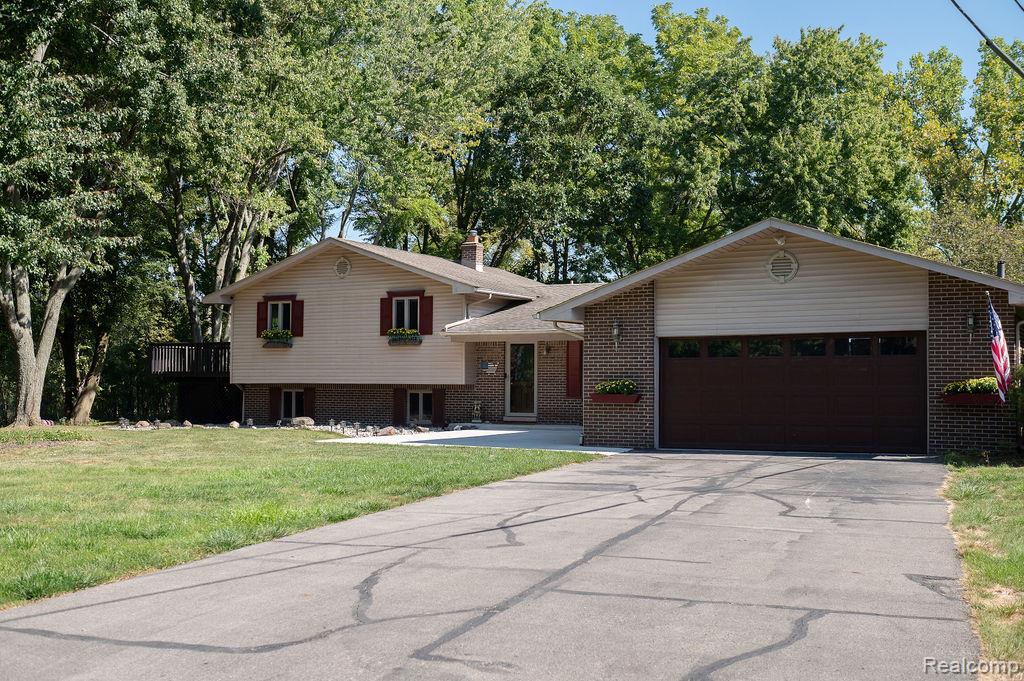 9482 Waterman Drive, Grosse Ile, MI 48138 — front exterior