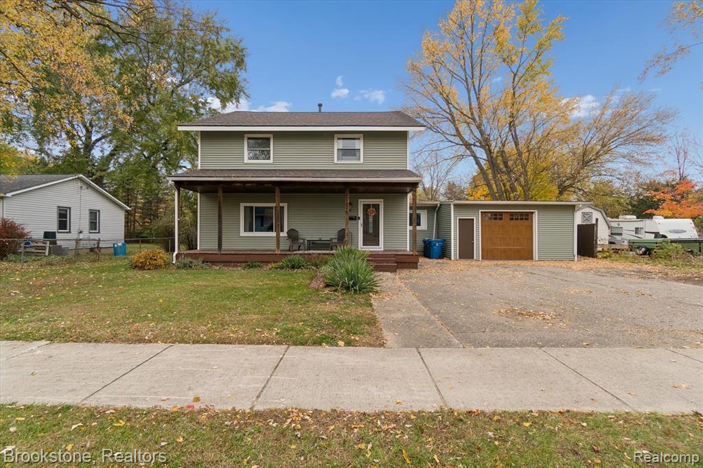 212 Airport Drive, Holly, MI 48442 — front exterior