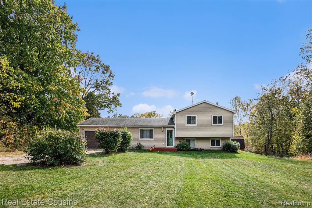 8351 Lange Road, Fowlerville, MI 48836 — front exterior