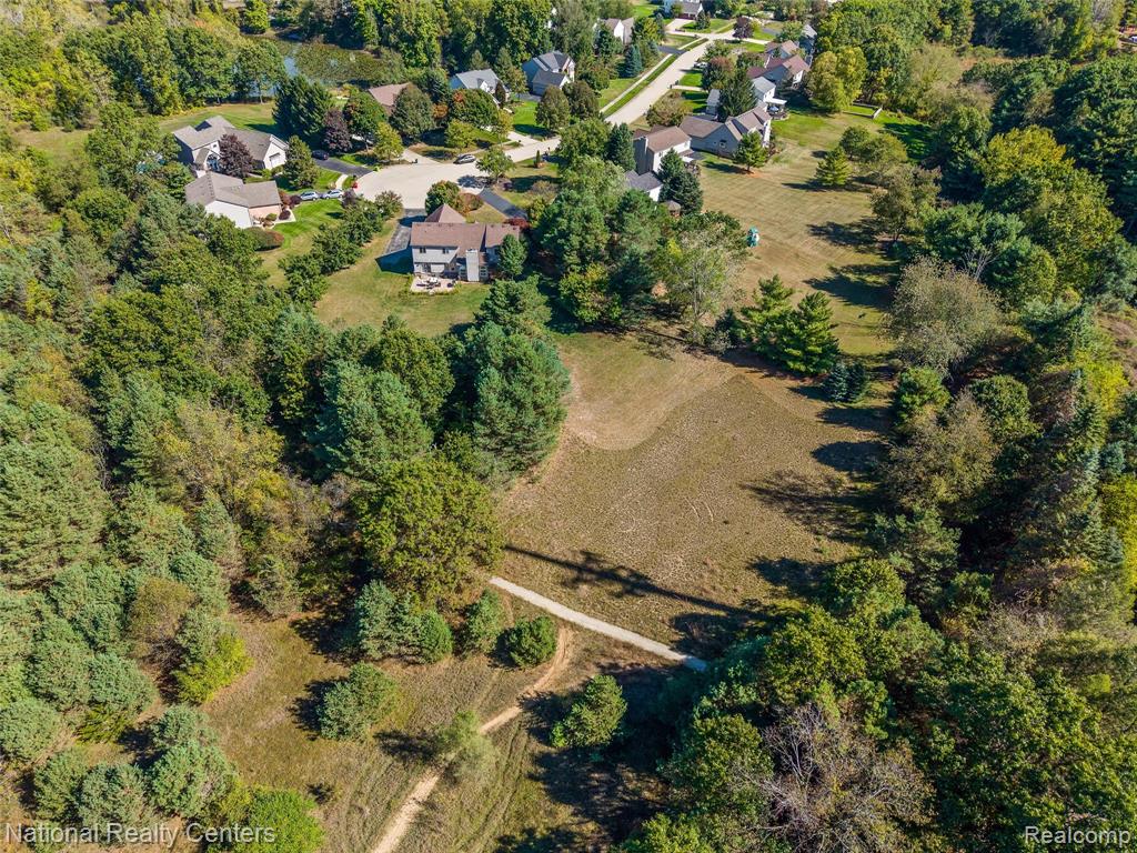 678 Joshua Drive, Highland, MI 48356 — Photo 44