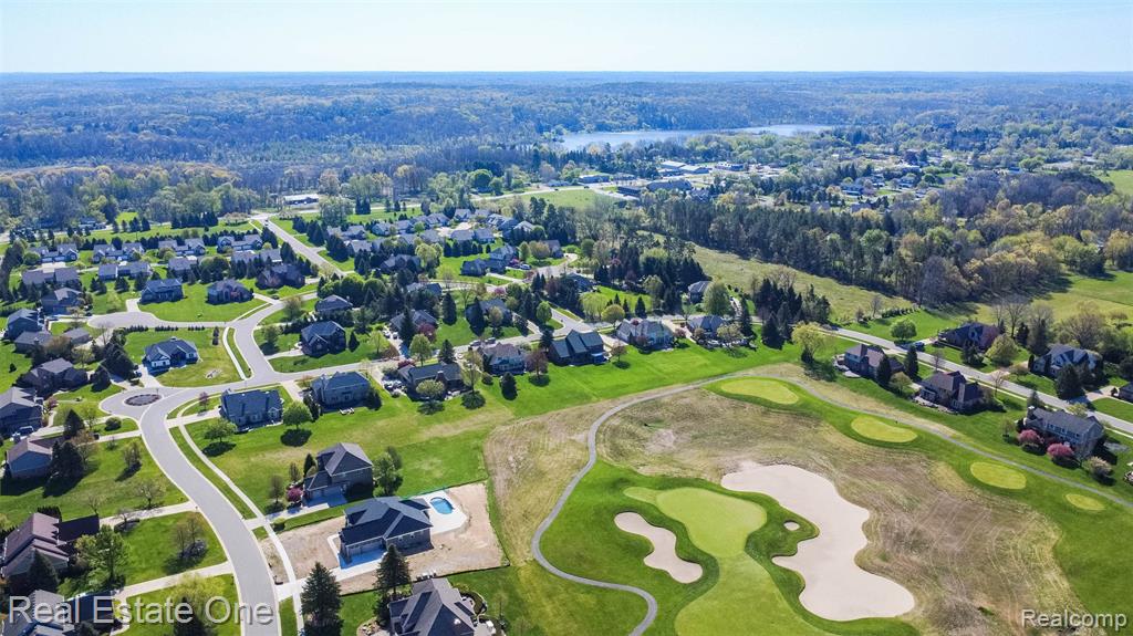 Aerial perspective of home backing up to the golf course