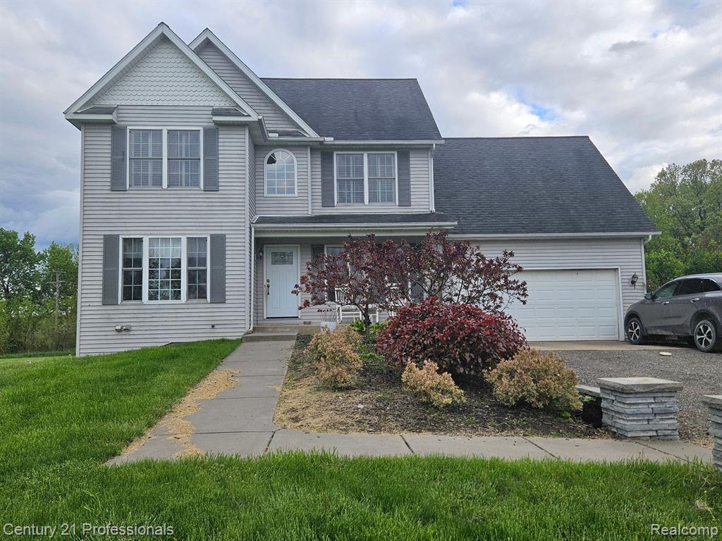1451 ASHLYN Court, Fowlerville, MI 48836 — Photo 2