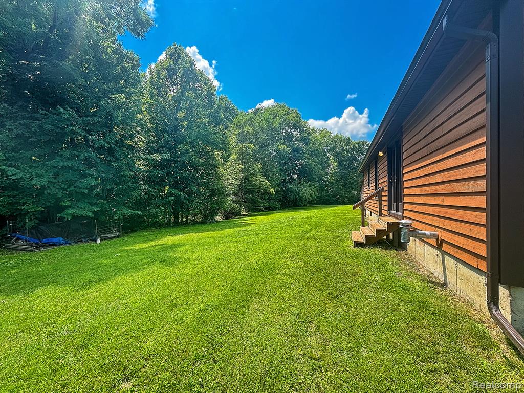 7653 CHASE LAKE Road, Fowlerville, MI 48836 — Photo 71