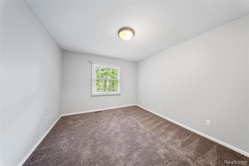 8487 Sherwood Drive, Grosse Ile, MI 48138 — Photo 31