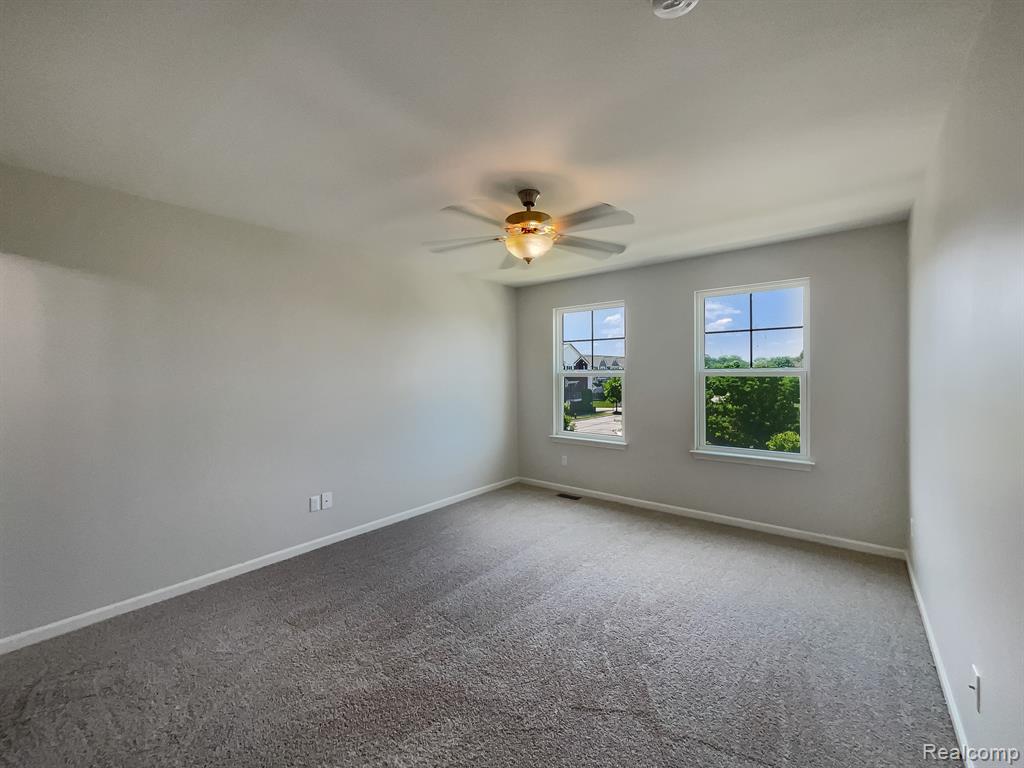 242 CENTER Boulevard, Wixom, MI 48393 — Photo 13