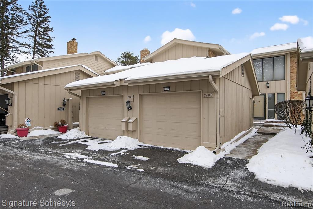 7107 Pebble Park Drive, 163, West Bloomfield, MI — front exterior