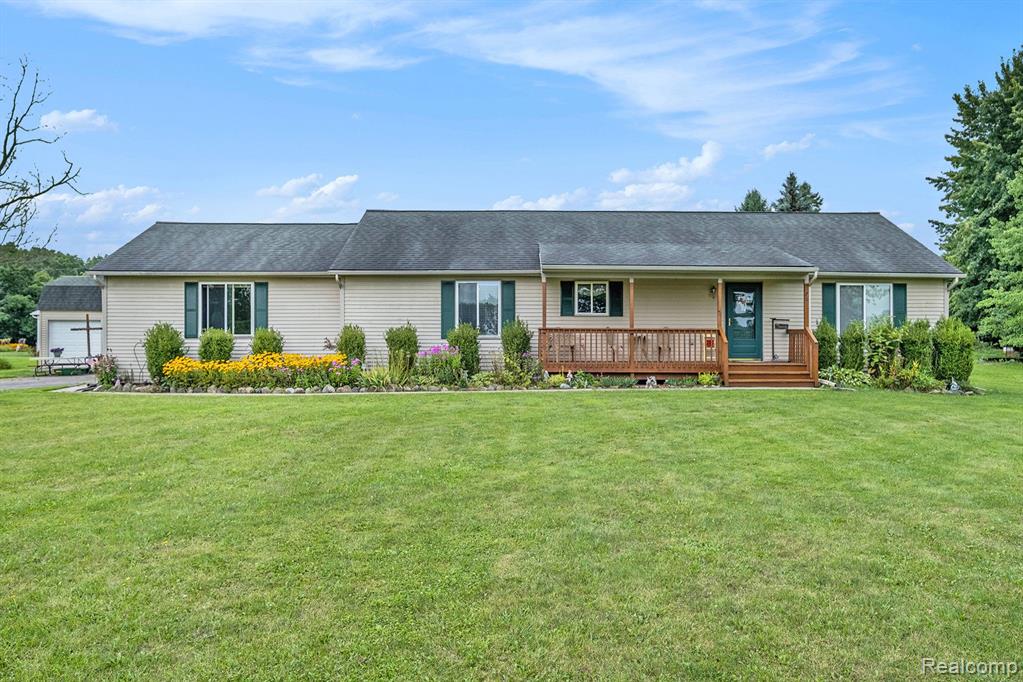 701 CHASE LAKE Road, Howell, MI 48855 — front exterior