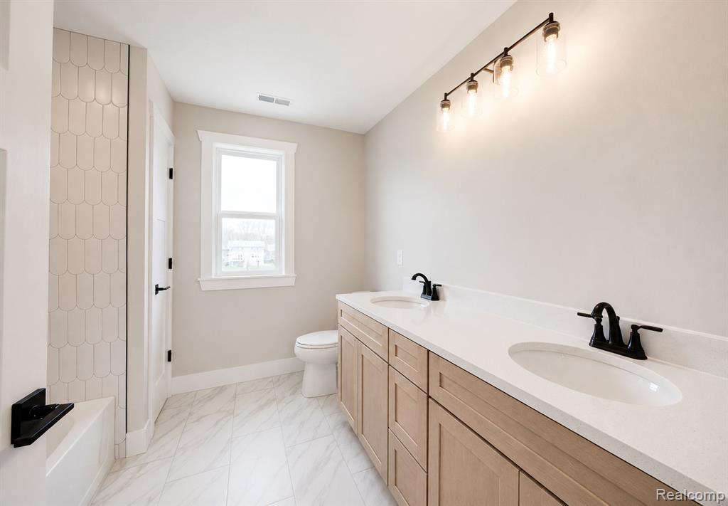 591 ROUND ROCK, Howell, MI 48843 — Photo 12