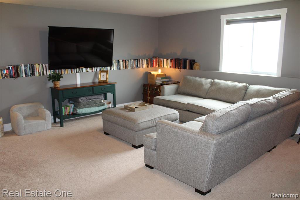 8662 Pinnebog River Drive, Fowlerville, MI 48836 — Photo 15